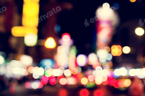 Preview: Blurred street bokeh lights at night time
