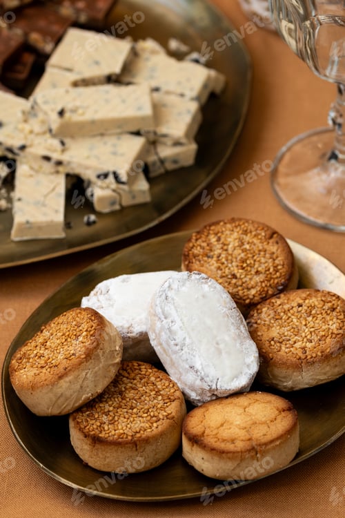 Preview: Spanish sweets polvorones and mantecados with sesame alongside turron