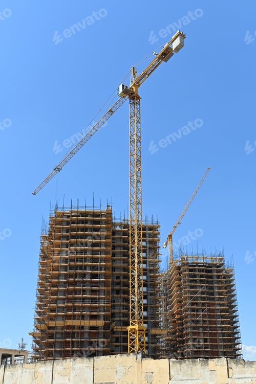 Preview: Cranes at construction site in new urban developing zone