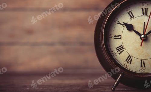 Preview: Retro alarm clock on a table.