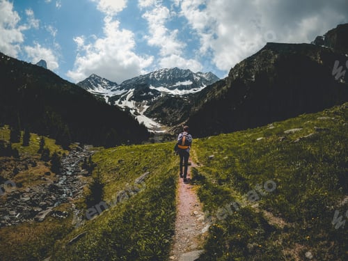Preview: Young man hiking to the mountains. Road trip adventure in Romania’s beauty. Fagaras Mountains.