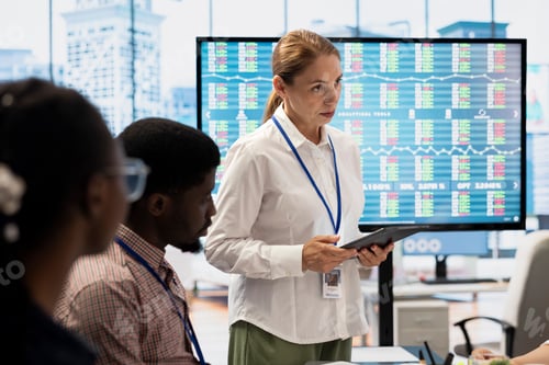 Preview: Diverse work team collaborating on project management tasks