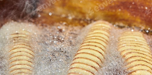 Preview: Cooking spiral fried potato in boiling oil, rich in fat and calories fast food, unhealthy delicious