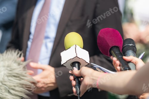 Preview: Journalist interviews a businessman at a green agenda press conference