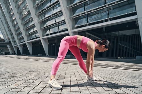Preview: Female is leaning and stretching hands to left foot