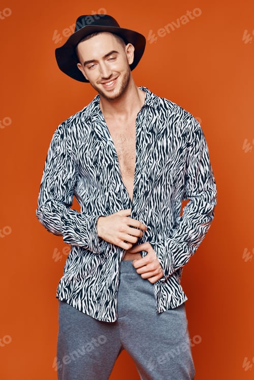 Preview: Cheerful man in black hat shirt elegant style model isolated background
