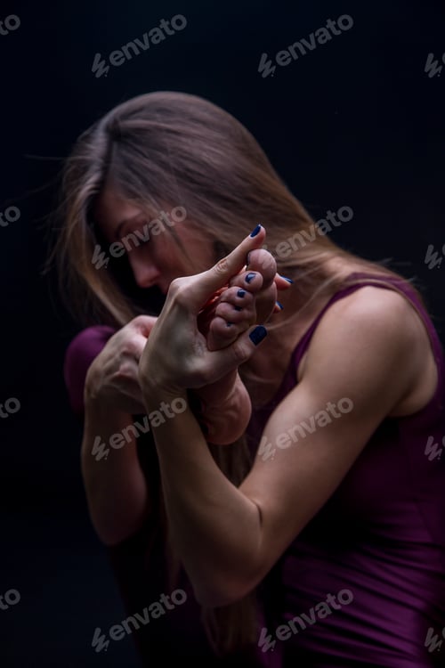 Preview: Young woman practicing yoga