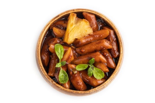 Preview: Tteokbokki or Topokki, fried rice cake stick isolated on white, top view