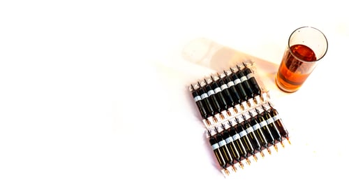 Preview: lot of ampoules on light background. banner with copy space