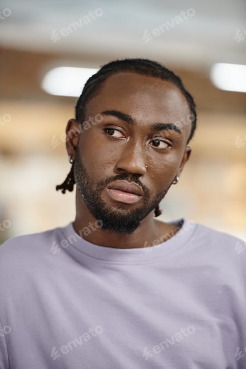 Preview: portrait, african american man in purple sweatshirt looking away, generation z, startup, coworking