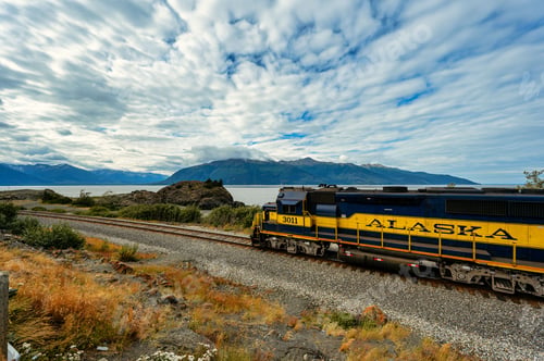 Preview: Alaska Railroad in Anchorage, Alaska with the beautiful sea and mountains in the background