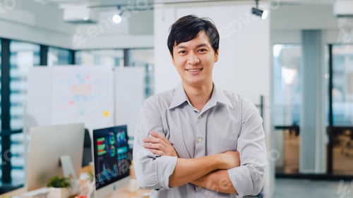 Preview: Portrait of successful businessman smart casual wear looking at camera and smiling.