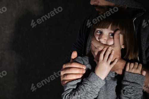 Preview: Adult man covering scared little girl's mouth, space for text. Child in danger