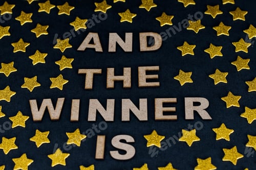 Preview: Flat lay photography with the phrase "And the winner is"
