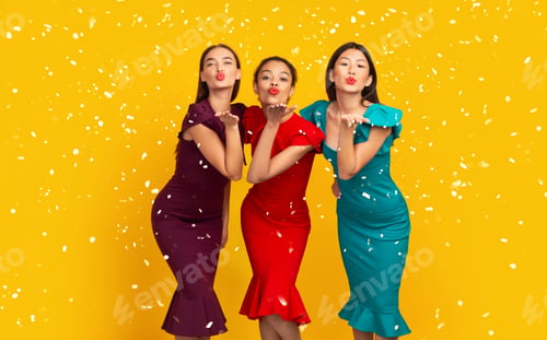 Preview: Three Diverse Girls In Dresses Sending Air Kiss, Studio Shot