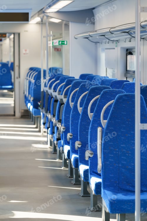 Preview: Interior of modern passenger high-speed express train, row of empty blue fabric soft seats.