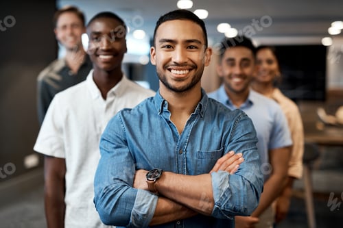Preview: Portrait of a group of confident young businesspeople working together in a modern office