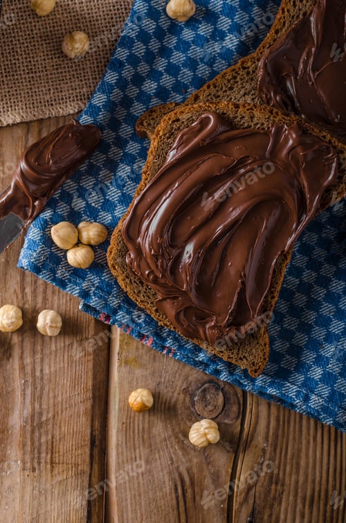 Chocolate Spread on Rustic Bread, Hazelnut Garnish
