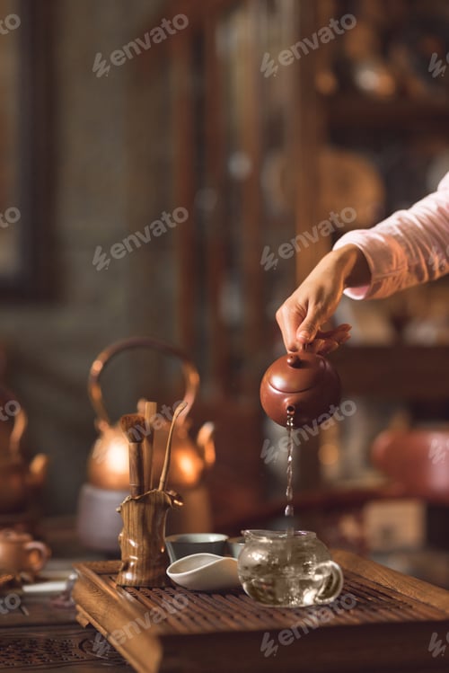 Preview: Master pouring tea from a teapot