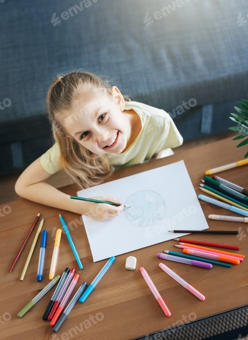 Preview: Child girl drawing with colorful pencils