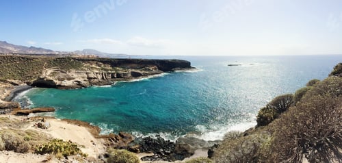 Preview: Panoramic view of a paradise beach on the island with turquoise waters and rocks