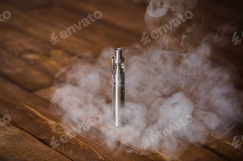 Preview: Electronic cigarette on a wooden table. Smoke.
