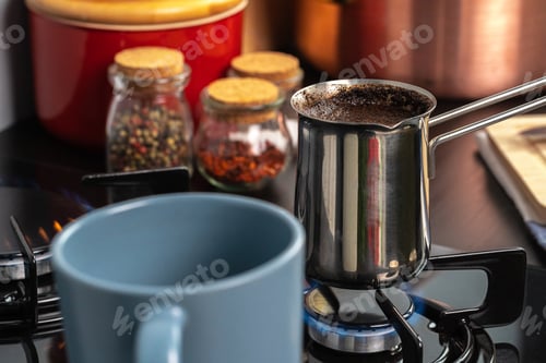 Preview: Brew coffee in a steel turk on a gas stove