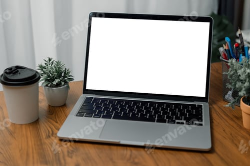Preview: Mock up laptop computer white screen on desk