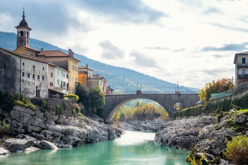Preview: Kanal on the Soca village in Slovenia with a beautiful arch bridge