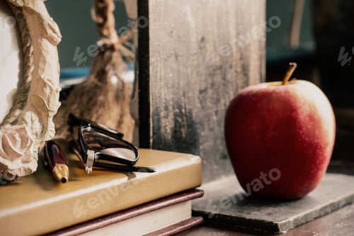 Preview: stationery and apple on desk