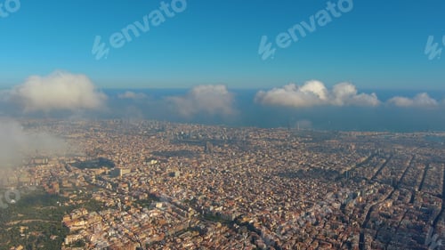 Preview: Barcelona City above the clouds and fog, Eixample residential famous urban grid