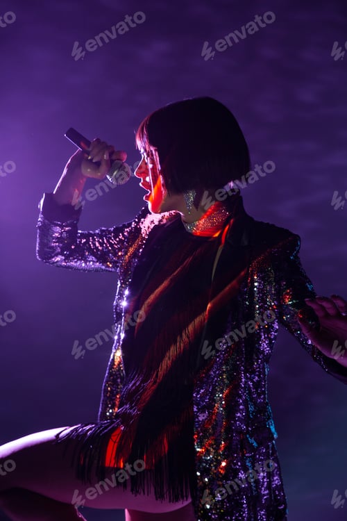 Preview: Stylish woman singing on stage