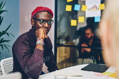 Preview: 20s creative dark skinned man writer pondering on idea
