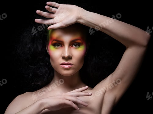 Preview: Attractive woman with colored make-up