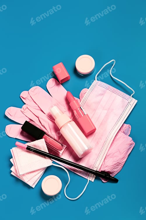 Preview: female protective travel cosmetic bag set. Pink mask, gloves, sanitizer, lip gel, pencil and lipstic