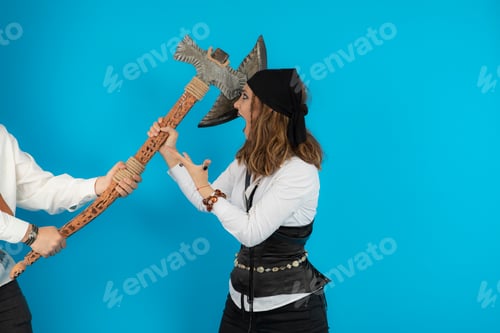 Preview: O++Pirate girl fighting with man and holding his ax