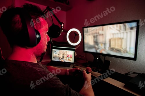 Preview: a gamer playing and streaming live with microphones and cameras
