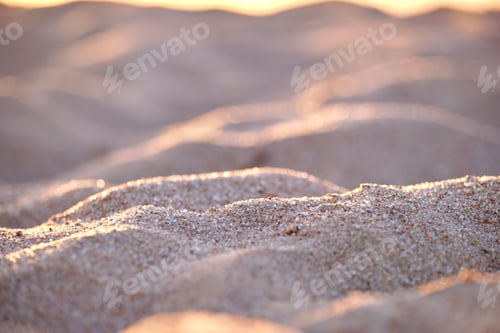 Preview: Close up of clean yellow sand surface covering seaside beach