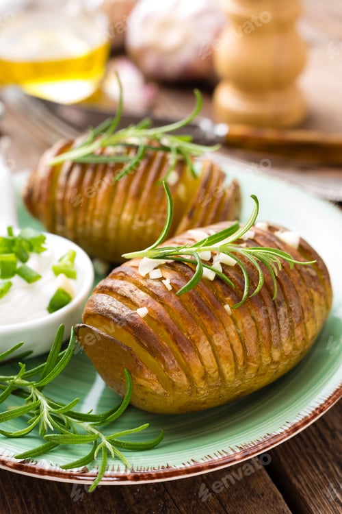 Preview: Baked potato. Potato oven baked with garlic and rosemary