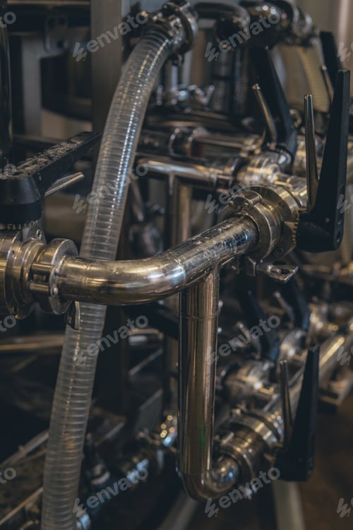 Preview: Closeup shot of beer brewery equipment