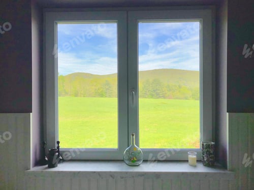 Preview: A bathroom with a view of acres of field and October Mountain.