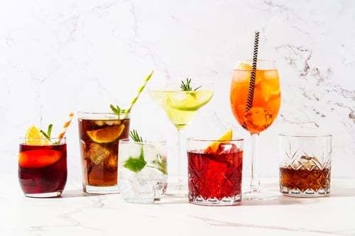 Preview: Different cocktail drinks with hard shadows at white background.