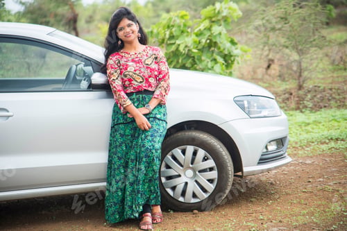 Preview: Beautiful young girl with car