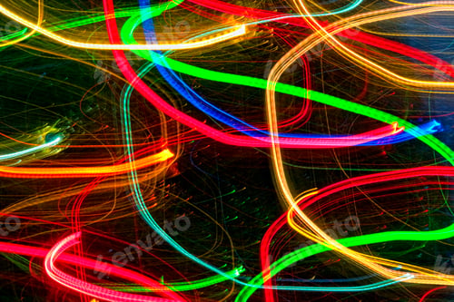 Preview: Abstract light trails on dark background.