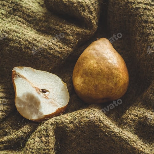 Preview: Autumn nature concept. Fall pears on knitted sweaters. Thanksgiving dinner
