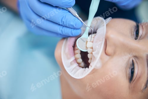 Preview: Young woman having filling put in clinic