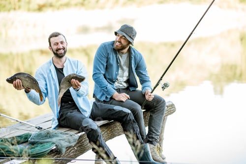 Preview: Fishermen with fish on the lake