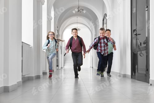 Preview: Group of happy classmates laughing and running