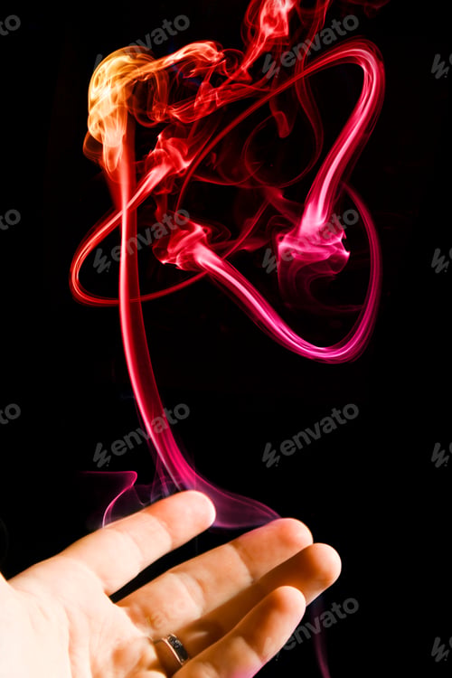 Preview: Smoke coming out from the hand, magic trick, incense stick smoke