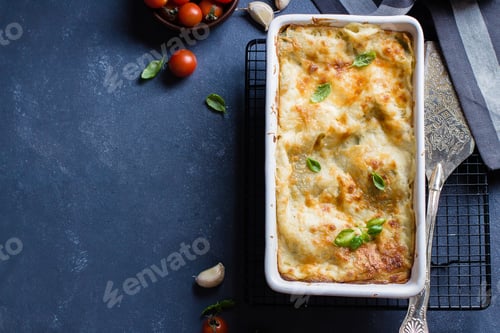 Preview: Delicious homemade lasagne with ricotta cheese and spinach on table . Vegetarian Food. Italian Food